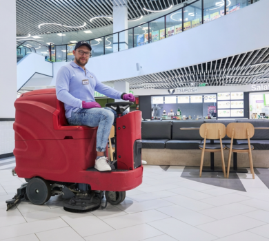 Professional cleaning in shopping centers: CPG high-tech floor scrubber machine maintaining a luxury mall atrium.